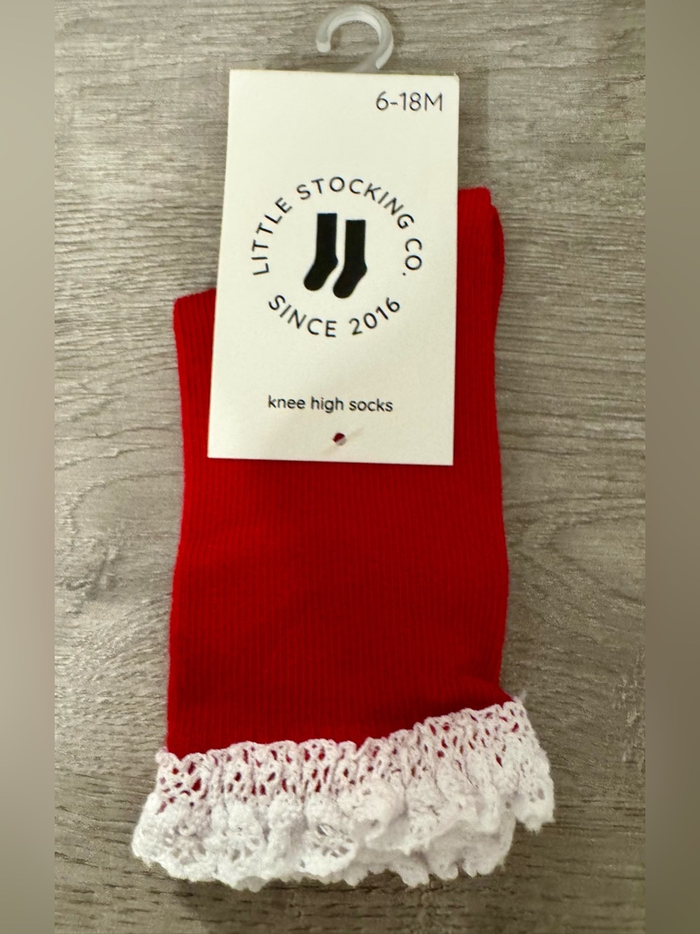 Little Stocking Co. — Red knee-high socks with lace trim at the top. Size:6-18 m
